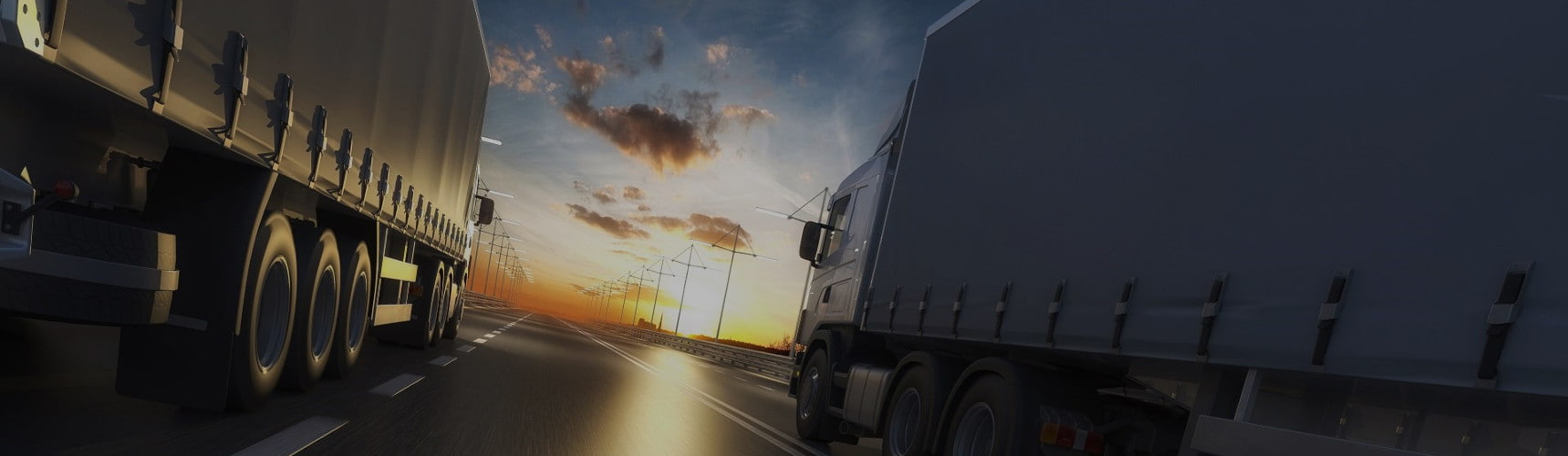 Divulgar transportadora: dois caminhões viajam em uma rodovia